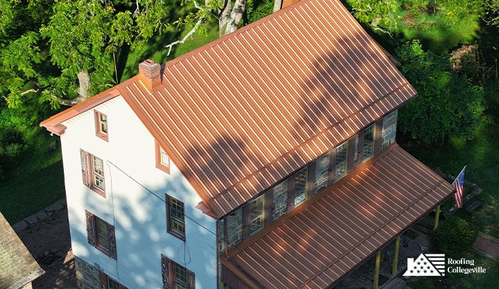 Traditional home with stylish copper-colored metal roofing.